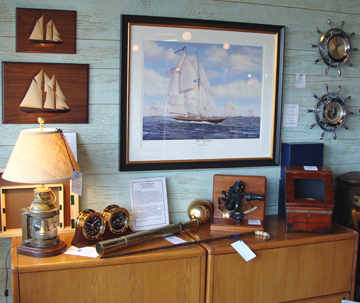 A collection of nautical antique instruments, Schooner Virginia half hull models by Everett Peterson and a framed giclee print of the Schooner Virginia by William R. Beebe